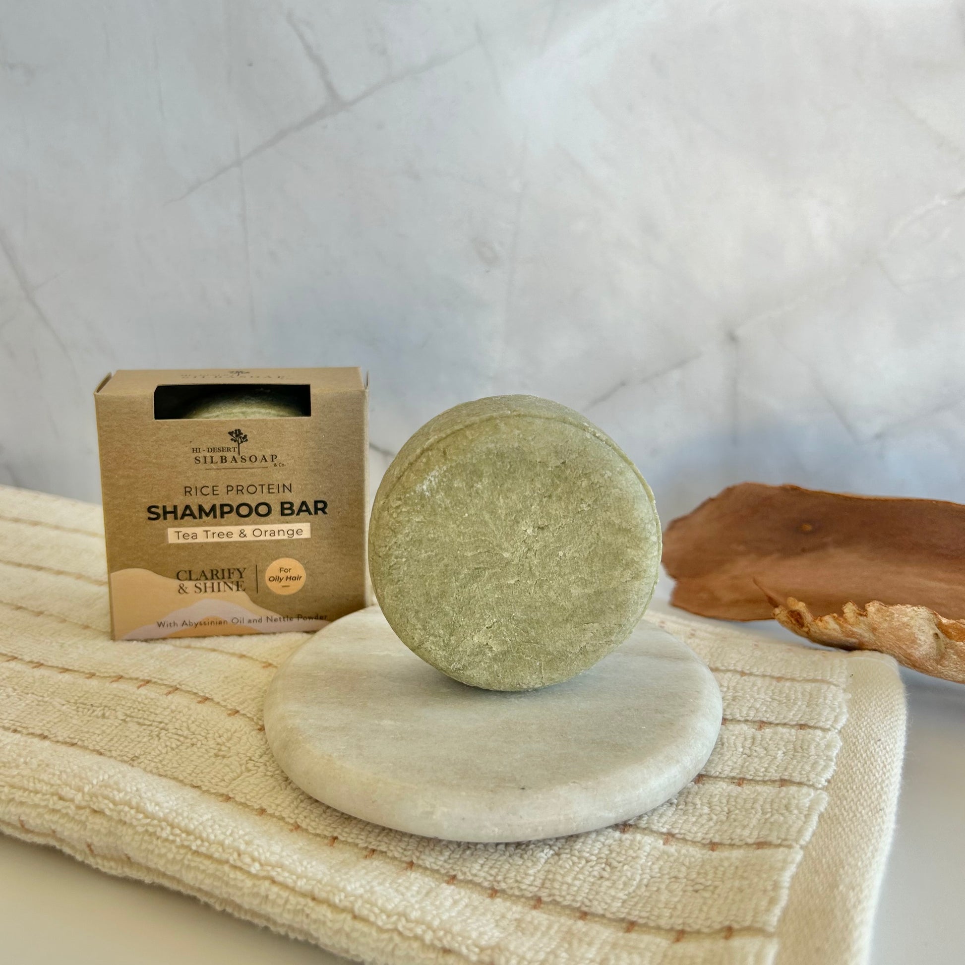 Clarify & Shine Shampoo Bar on towel