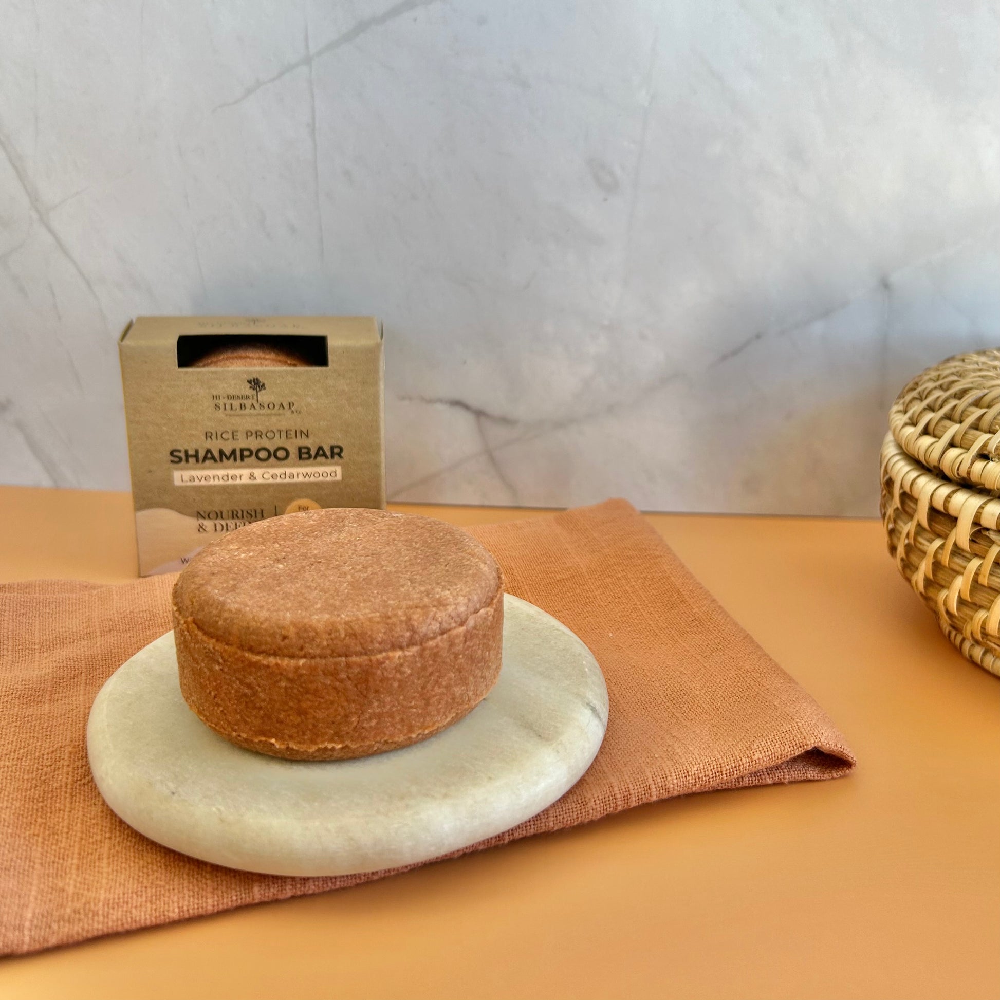 Nourish & Define Shampoo Bar on kitchen towel